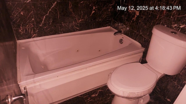 3145 Bernice Rd Unit 4, Lansing, IL 60438 - full bathroom with toilet, marble finish floors, and a jetted tub