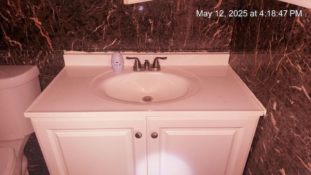 3145 Bernice Rd Unit 4, Lansing, IL 60438 - half bathroom featuring vanity and toilet