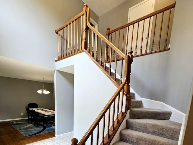 1602 Nightengale Cir, Lindenhurst, IL 60046 - stairs with a chandelier and baseboards