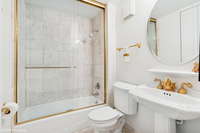 111 E Chestnut St Unit 39C, Chicago, IL 60611 - full bathroom with toilet, shower / bath combination with glass door, and a sink