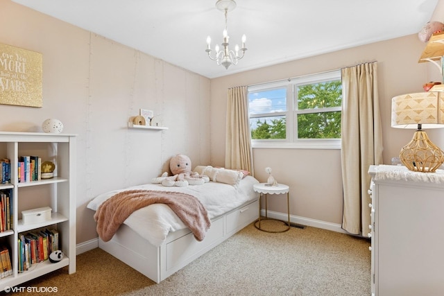 269 Cascade Dr, Crystal Lake, IL 60012 - carpeted bedroom featuring a chandelier and baseboards