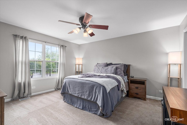 616 Springbrook Trl N, Oswego, IL 60543 - bedroom featuring light colored carpet, baseboards, and ceiling fan