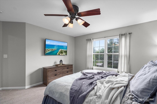 616 Springbrook Trl N, Oswego, IL 60543 - bedroom featuring light carpet, baseboards, and a ceiling fan