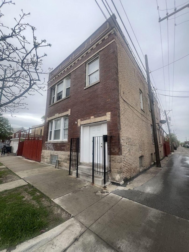3945 W Augusta Blvd, Chicago, IL 60651 - view of side of property featuring brick siding