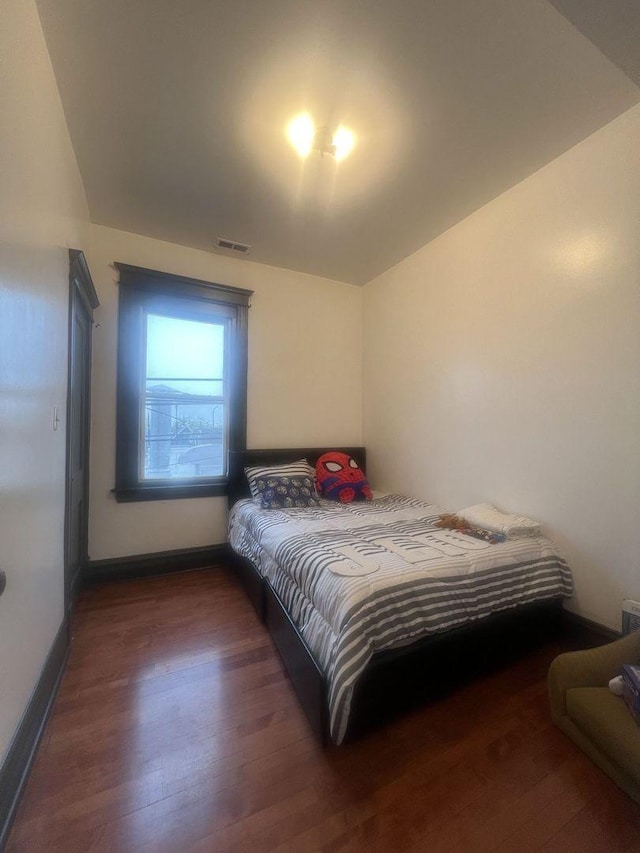 3945 W Augusta Blvd, Chicago, IL 60651 - bedroom featuring wood finished floors and baseboards