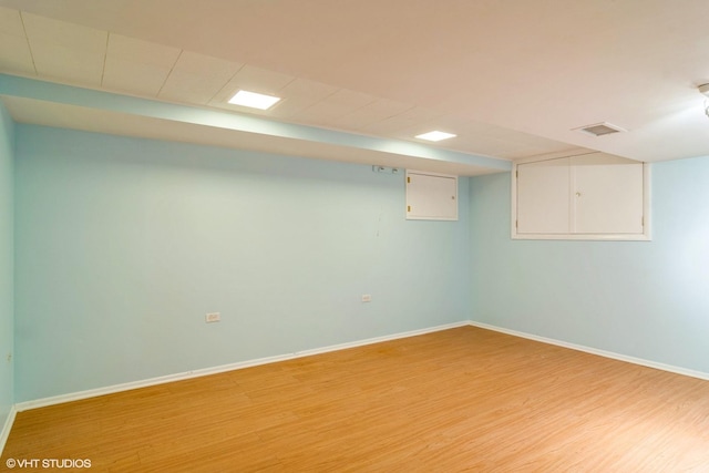 1921 E Peachtree Ln, Arlington Heights, IL 60004 - finished below grade area with light wood finished floors and baseboards