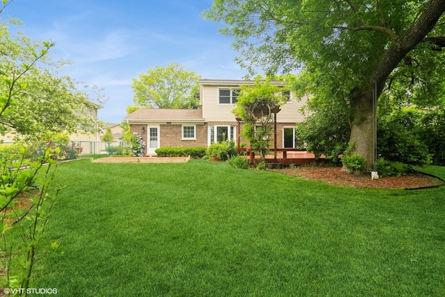 1921 E Peachtree Ln, Arlington Heights, IL 60004 - rear view of house featuring brick siding and a deck