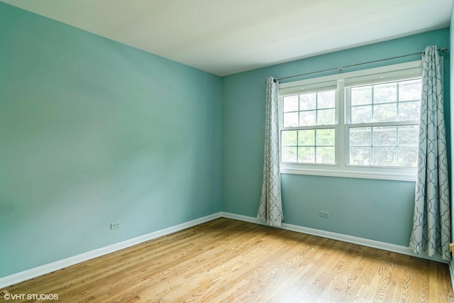 1921 E Peachtree Ln, Arlington Heights, IL 60004 - unfurnished room with wood finished floors and baseboards