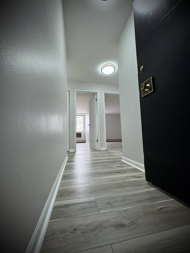 9720 S Pulaski Rd Unit 306, Oak Lawn, IL 60453 - hall with baseboards and wood finished floors