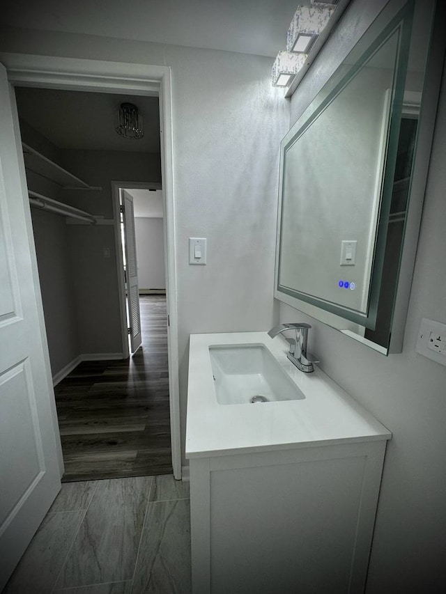 9720 S Pulaski Rd Unit 306, Oak Lawn, IL 60453 - bathroom with vanity and baseboards