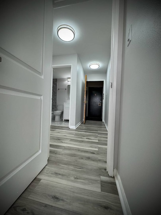 9720 S Pulaski Rd Unit 306, Oak Lawn, IL 60453 - corridor featuring baseboards and wood finished floors