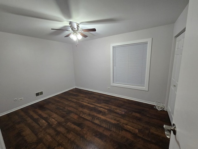 460 74th St Unit 102, Downers Grove, IL 60516 - unfurnished room featuring ceiling fan, dark wood-type flooring, and baseboards