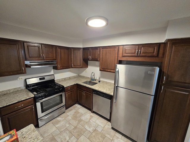 460 74th St Unit 102, Downers Grove, IL 60516 - kitchen with stainless steel appliances, extractor fan, a sink, dark brown cabinets, and stone finish flooring