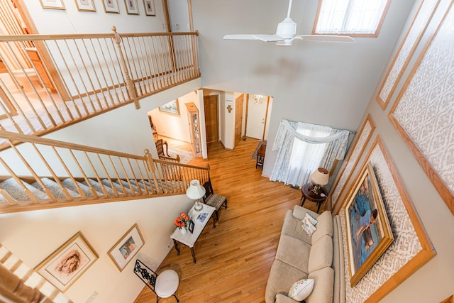 1607 Park Point, Ridge Point, Park Ridge, IL 60068 - living area featuring a towering ceiling, wood finished floors, and ceiling fan