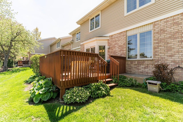 1607 Park Point, Ridge Point, Park Ridge, IL 60068 - rear view of property featuring a wooden deck, a yard, and brick siding