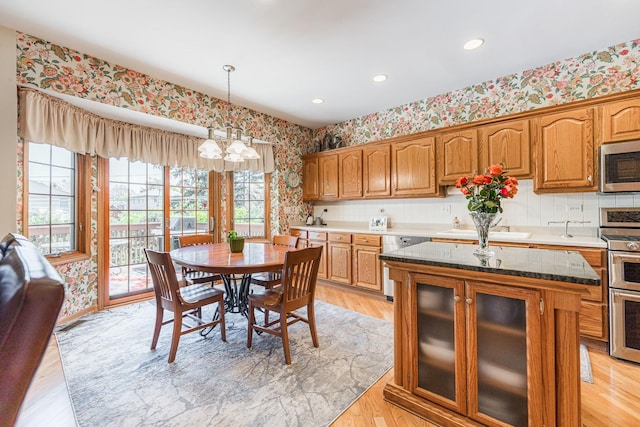 1607 Park Point, Ridge Point, Park Ridge, IL 60068 - dining area featuring wallpapered walls, a chandelier, light wood-style flooring, and recessed lighting