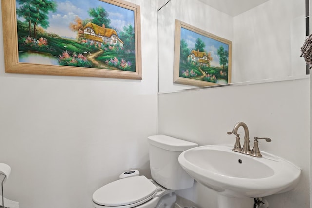 419 Glenshire Rd, Glenview, IL 60025 - half bathroom featuring toilet and a sink