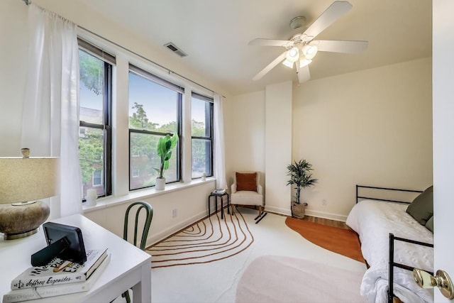 1954 W George St Unit 2, Chicago, IL 60657 - bedroom with multiple windows, baseboards, carpet floors, and ceiling fan