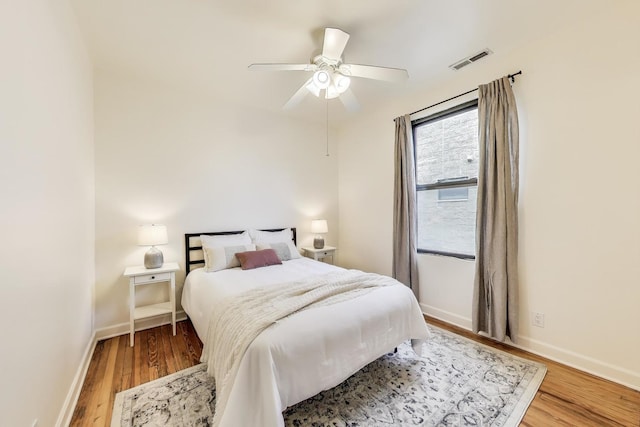1954 W George St Unit 2, Chicago, IL 60657 - bedroom with wood finished floors, baseboards, and a ceiling fan