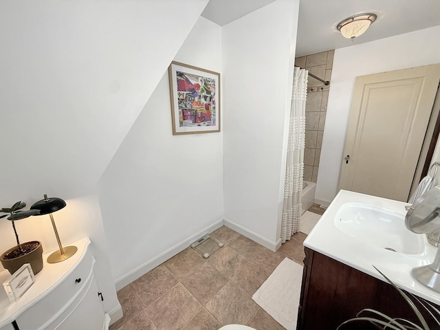 1351 W Stover St, Freeport, IL 61032 - full bathroom featuring vanity, baseboards, and shower / bath combo