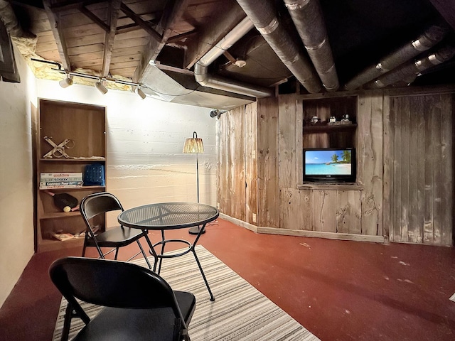 1351 W Stover St, Freeport, IL 61032 - game room featuring wooden walls and concrete flooring