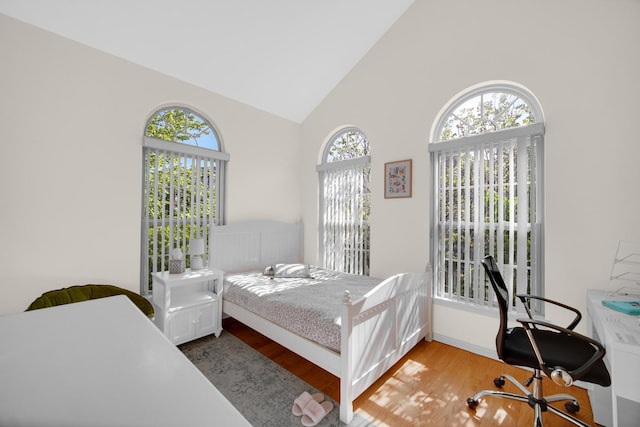 679 Prestwick Ln, Wheeling, IL 60090 - bedroom with wood finished floors and high vaulted ceiling