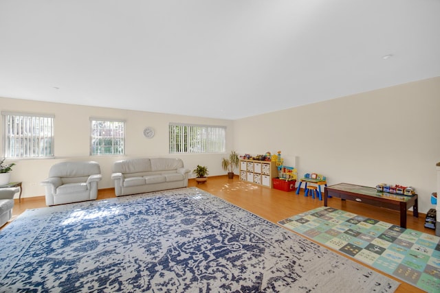 679 Prestwick Ln, Wheeling, IL 60090 - living room featuring healthy amount of natural light and wood finished floors