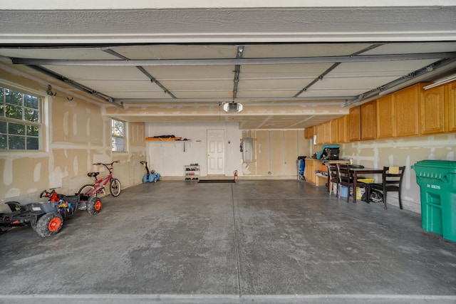 679 Prestwick Ln, Wheeling, IL 60090 - garage featuring a garage door opener and electric panel