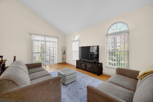 679 Prestwick Ln, Wheeling, IL 60090 - living room with high vaulted ceiling and wood finished floors