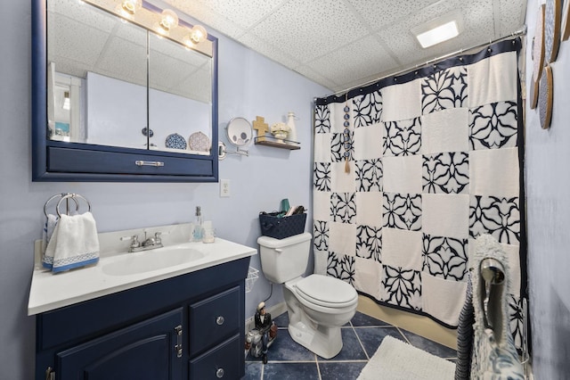 175 N Dogwood St, Cortland, IL 60112 - full bathroom with a paneled ceiling, toilet, tile patterned flooring, vanity, and curtained shower