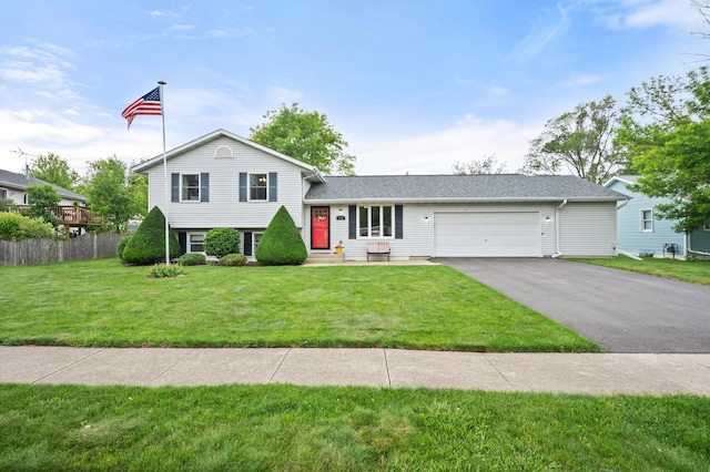 175 N Dogwood St, Cortland, IL 60112 - split level home with asphalt driveway, a garage, and a shingled roof
