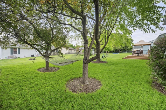 175 N Dogwood St, Cortland, IL 60112 - view of green lawn featuring a gazebo and a deck