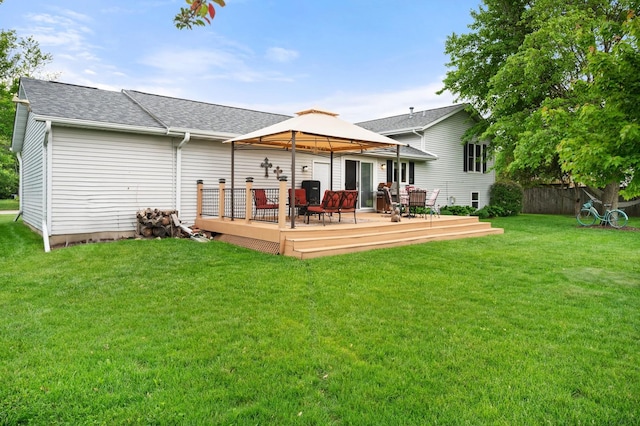 175 N Dogwood St, Cortland, IL 60112 - rear view of house with a gazebo, a yard, a wooden deck, and a shingled roof