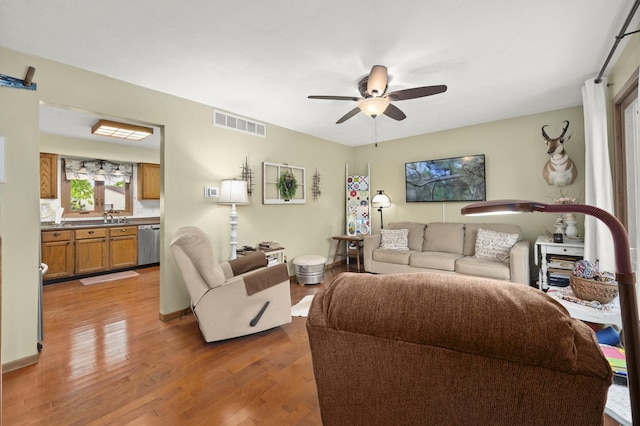 175 N Dogwood St, Cortland, IL 60112 - living room featuring a ceiling fan and light wood-style flooring