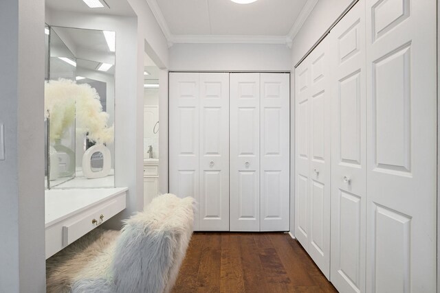 9737 N Fox Glen Dr Unit 5C, Niles, IL 60714 - corridor featuring crown molding and dark wood-type flooring
