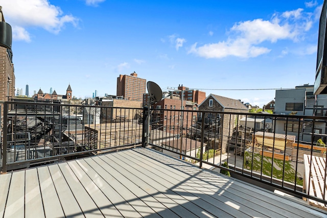 1513 W Walton St Unit 3, Chicago, IL 60642 - wooden terrace featuring a city view