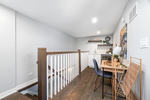 1513 W Walton St Unit 3, Chicago, IL 60642 - dining area featuring dark wood-style flooring, recessed lighting, beverage cooler, and a bar
