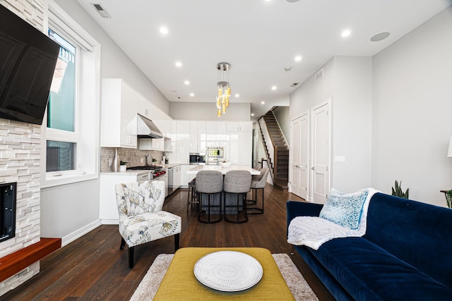 1513 W Walton St Unit 3, Chicago, IL 60642 - living room with stairway, dark wood finished floors, recessed lighting, and baseboards