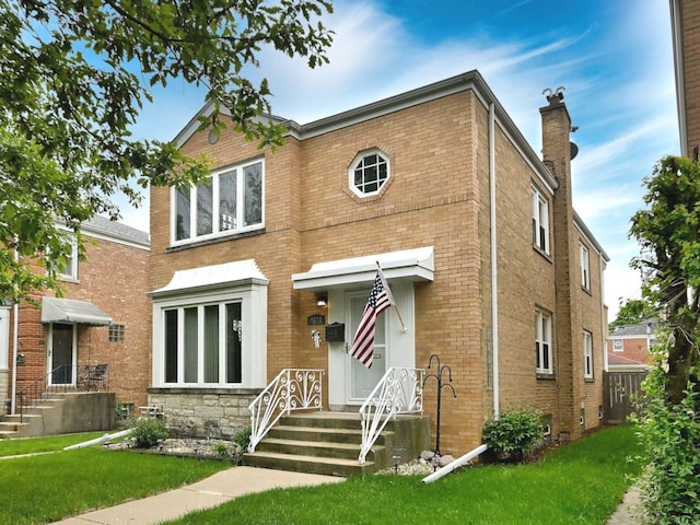 7513 W Isham Ave, Chicago, IL 60631 - view of front facade featuring brick siding and a front lawn