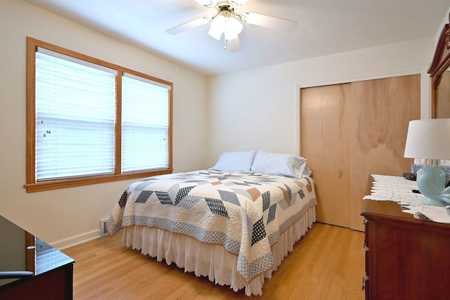 7513 W Isham Ave, Chicago, IL 60631 - bedroom featuring light wood finished floors, a closet, ceiling fan, and baseboards