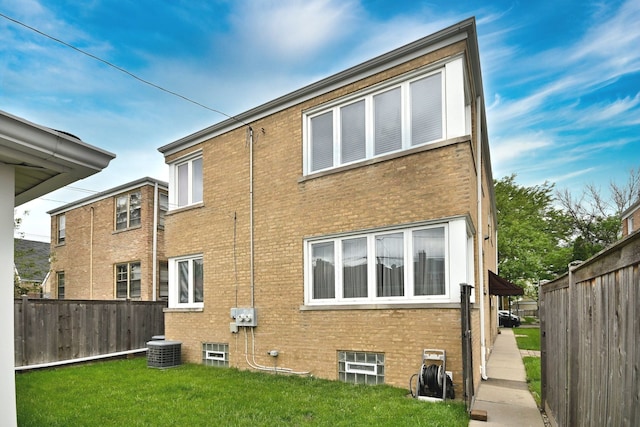7513 W Isham Ave, Chicago, IL 60631 - back of house featuring brick siding and cooling unit