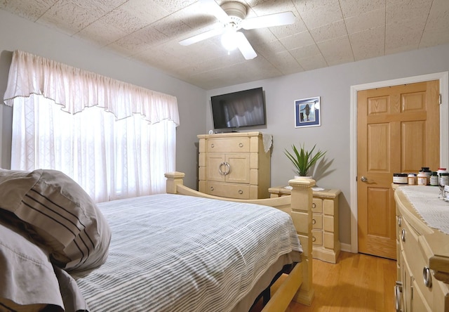 7513 W Isham Ave, Chicago, IL 60631 - bedroom featuring light wood-type flooring and a ceiling fan