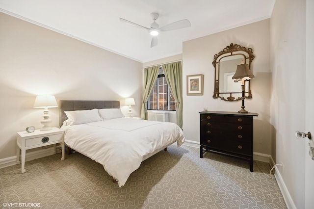 734 Noyes St Unit L1, Evanston, IL 60201 - carpeted bedroom with crown molding, baseboards, and a ceiling fan