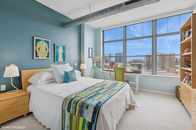 1200 W Monroe St Unit 808, Chicago, IL 60607 - carpeted bedroom with a view of city and baseboards