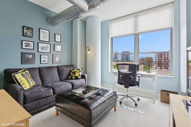 1200 W Monroe St Unit 808, Chicago, IL 60607 - carpeted living area featuring an office area, a view of city, and baseboards
