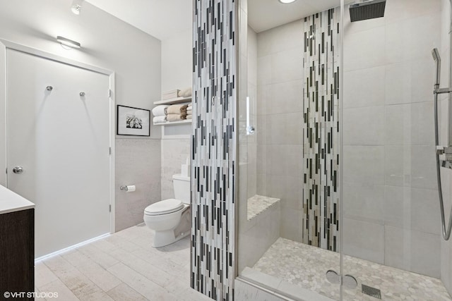 1200 W Monroe St Unit 808, Chicago, IL 60607 - full bath with a stall shower, toilet, tile walls, and vanity