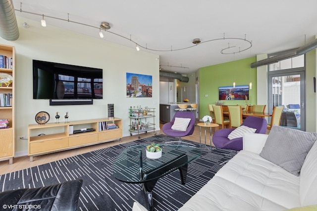 1200 W Monroe St Unit 808, Chicago, IL 60607 - living area with track lighting and wood finished floors