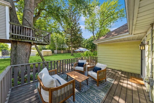 114 Washington St, Bloomingdale, IL 60108 - wooden terrace with a trampoline, a yard, and an outdoor hangout area