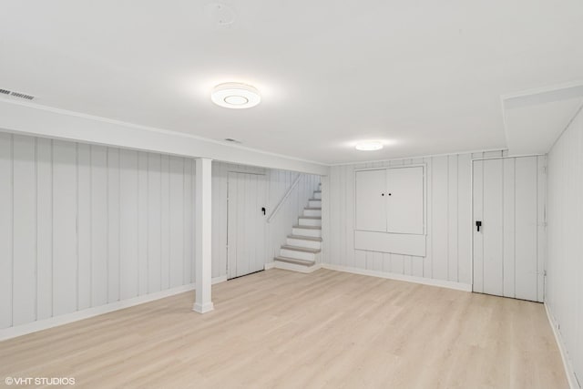 1552 Mccraren Rd, Highland Park, IL 60035 - finished below grade area featuring wood finished floors and stairs