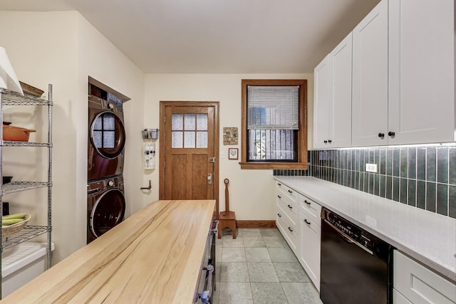 5143 S Greenwood Ave Unit 1, Chicago, IL 60615 - kitchen featuring dishwasher, stacked washer / dryer, tasteful backsplash, butcher block countertops, and white cabinetry